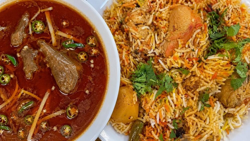 A bowl of beef nihari and a plate of chicken biryani at Chutneys Halal Kitchen